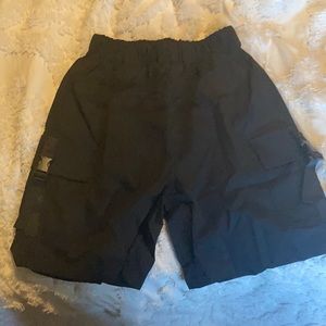 Black cargo shorts with buckles